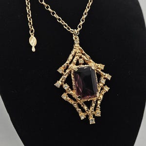 Vintage Sarah Coventry Purple Crystal Necklace: Textured Goldtone Pendant