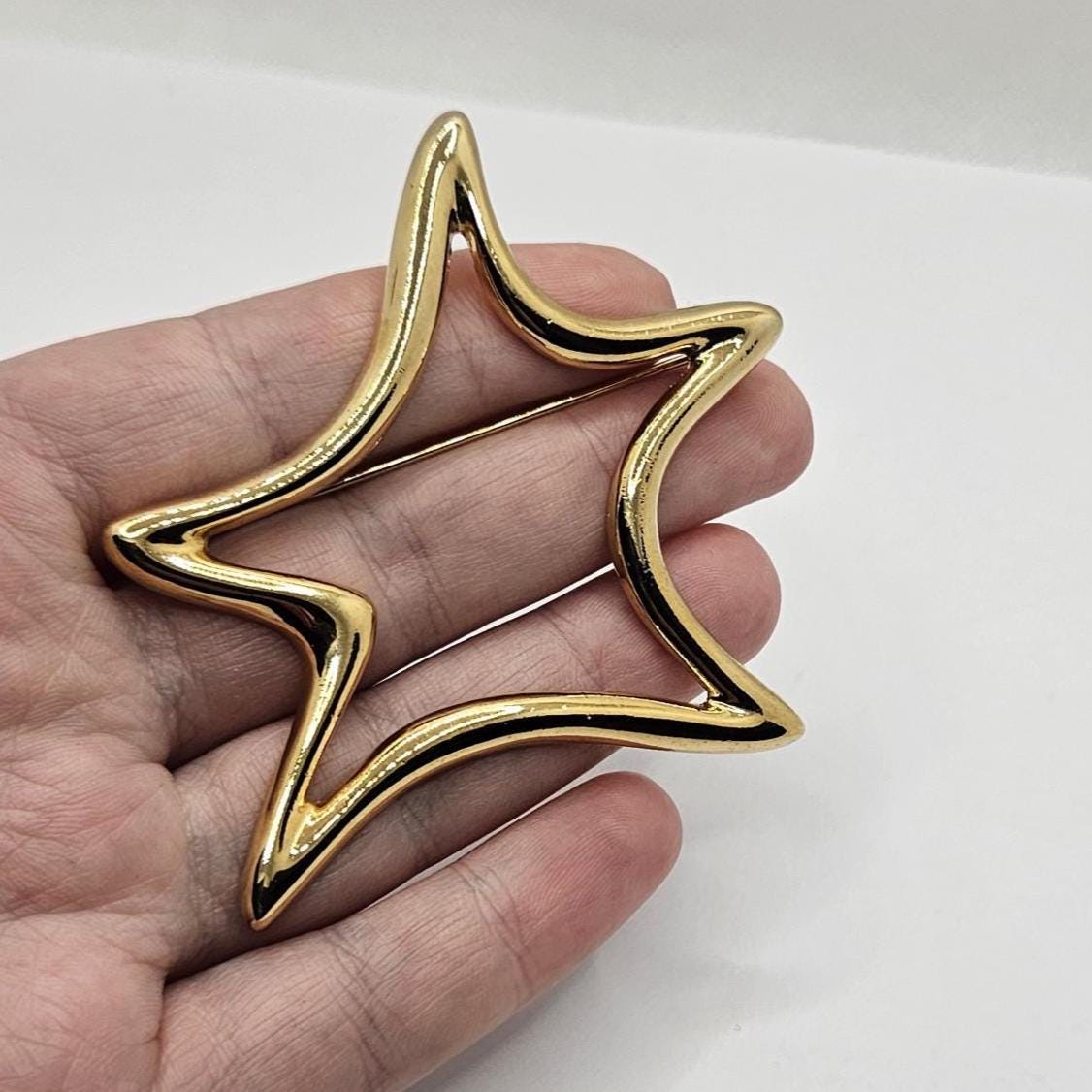 Broche en métal doré brillant bijoux vintage années 80 nœud