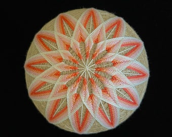 handmade temari ball with traditional Japanese kiku pattern, "chrysanthemum" flower