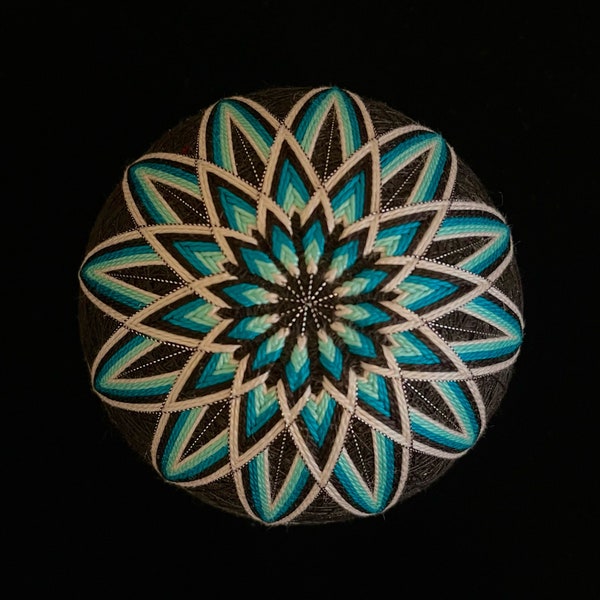 handmade temari ball with traditional Japanese kiku pattern, "chrysanthemum" flower