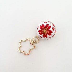 Gold sakura/cherry blossom Key chain｜Bag charm. Handmade mini temari ball with sakura patter on red core ball, gold metallic thread