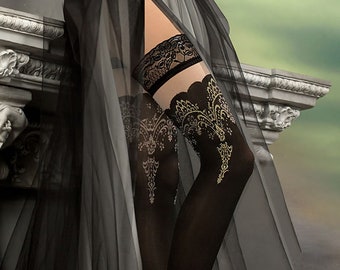 Striking semi opaque hold ups in black with embroidered tops scalloped edging and sumptuous gold Lurex detailing.