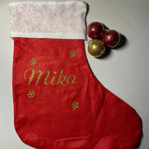 Calza natalizia personalizzata con stivali da Babbo Natale