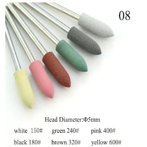 May include: Set of 6 sanding bands with different grit levels: white 150#, black 180#, green 240#, brown 320#, pink 400#, and yellow 600#. Each band has a 5mm diameter head and is attached to a metal rod.