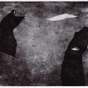 May include: Two figures in black robes stand in a dark, grainy landscape. One figure is facing away from the viewer, while the other is facing the viewer with their back to the camera. The figures are silhouetted against a light background.