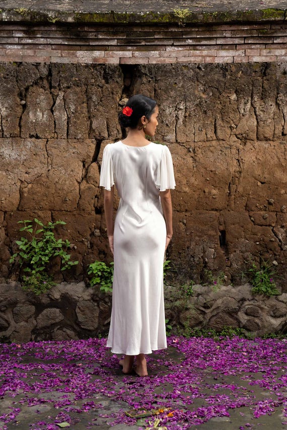 white silk dress dyed with tiger butterflies and waves detail L'AGENCE Sayla Silk Gown In Ecru Multi Lock Butterfly