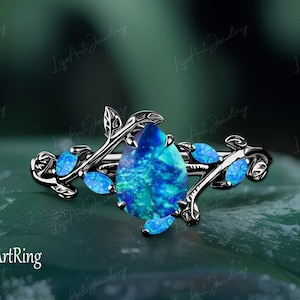 Pear Shaped Blue Opal Engagement ring Black Gold Promise Ring for her Leaf and vine Ring Alternative Gemstone Ring Anniversary gifts Women