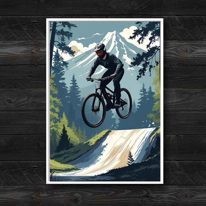 Puede incluir: Un p&oacute;ster vertical que muestra a un ciclista de monta&ntilde;a en el aire, saltando desde una rampa de tierra. El ciclista lleva casco y ropa oscura. El fondo muestra un gran pico nevado, densos &aacute;rboles de hoja perenne y un cielo despejado.