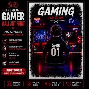 May include: A black and red gaming wall art print. The print features a gamer in a black hoodie with the number 01, playing a video game. The word "GAMING" is at the top, with the text "PLAY TO WIN". The print includes the text "PREMIUM GAMER WALL ART PRINT".