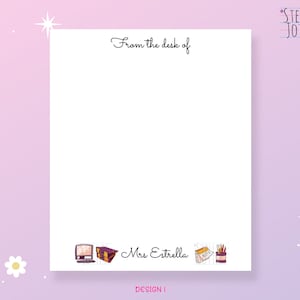 May include: White notepad with the text "From the desk of" at the top and "Mrs. Estrella" at the bottom. The notepad has a design of a computer, a suitcase, a calendar, and a pencil holder.