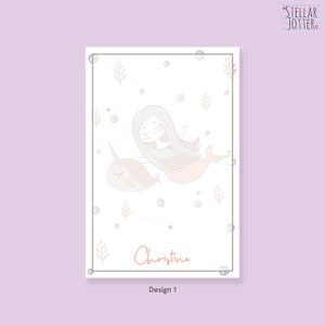 May include: A printable design featuring a mermaid and a narwhal swimming in a sea of bubbles. The design includes the name "Christine" and the text "Design 1".