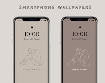 Pode incluir: Duas telas de bloqueio de smartphone com um design minimalista. As telas são bege com um contorno branco de uma pessoa sentada com uma xícara. O horário é 10:00 e a data é domingo, 29 de agosto. O texto "Loving my hot choco" está abaixo da imagem.