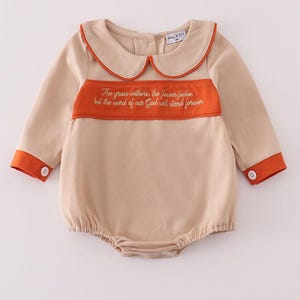 May include: A set of three ceramic mugs with a speckled, matte finish. The mugs are in shades of cream, light gray, and dark gray. Each mug has a simple, minimalist design and a rounded handle.