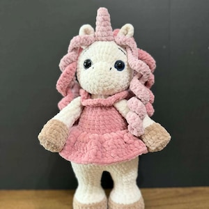 Crocheted unicorn plush toy, Soft amigurumi, Decorative stuffed animal