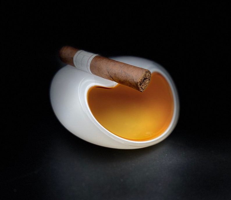 Cigar ashtray, can hold up to 2 cigars.
3-layer glass technique.
Unique modern design.
High quality Bohemian glass from the Czech Republic.