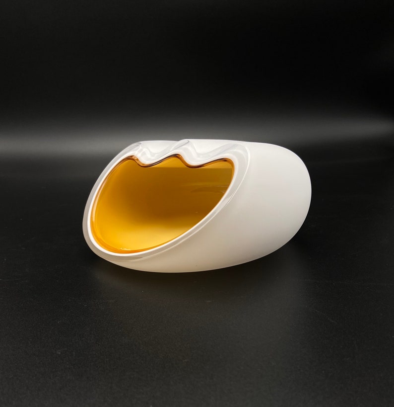 Cigar ashtray, can hold up to 2 cigars.
3-layer glass technique.
Unique modern design.
High quality Bohemian glass from the Czech Republic.