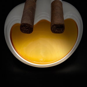 Cigar ashtray, can hold up to 2 cigars.
3-layer glass technique.
Unique modern design.
High quality Bohemian glass from the Czech Republic.