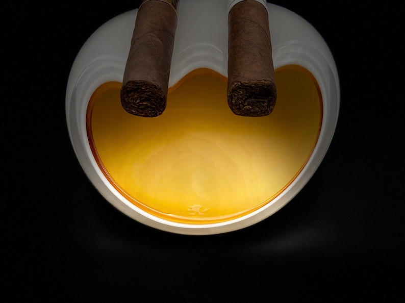 Cigar ashtray, can hold up to 2 cigars.
3-layer glass technique.
Unique modern design.
High quality Bohemian glass from the Czech Republic.