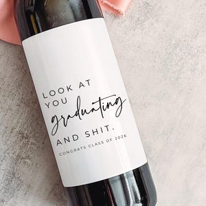 Look at you graduating and shit class of 2026 wine label
best selling graduation gifts
graduation gift ideas for her
graduation wine label
class of 2026 gifts
