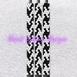 May include: Three black and white patterned pens with a black cap and tip.