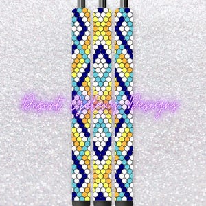 May include: Three black pens with a geometric pattern of blue, yellow, white, and orange circles. The pens are decorated with a repeating pattern of diamonds.