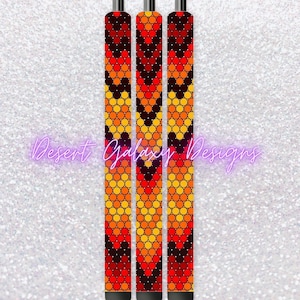 Può includere: Tre penne nere con un motivo geometrico di cerchi rossi, arancioni e gialli. Il motivo assomiglia a un favo.