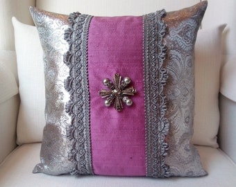 Silver damask pillow with purple Dupioni silk panel, gray trim and gunmetal, pearl, rhinestone brooch; feather/down, hand-worked