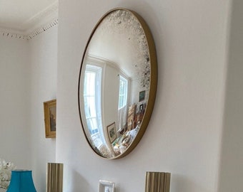 The Convex Mirror Company- Ferrara 100 with brushed gold frame.