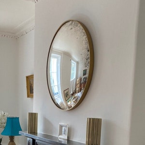 The Convex Mirror Company- Ferrara 100 with brushed gold frame.