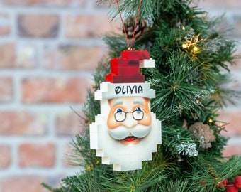 Santa bauble with personalisation for hanging on a Christmas tree. Made with small building bricks