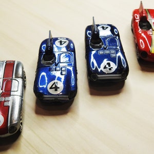 1990s Hot Wheels Jaguar D-Type Collection - Vintage Die Cast Cars in Vibrant Colors - Used Condition