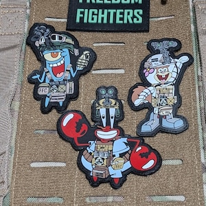 May include: Four embroidered patches featuring cartoon characters from the popular animated television series Spongebob Squarepants. The patches are attached to a brown tactical vest with a black patch that reads "RONIN FREEDOM FIGHTERS".