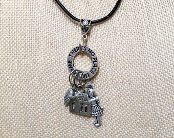 Wizard of Oz Charm Necklace "There's No Place Like Home" Circle Carrier with Dorothy, Corn, and House Charms, Adjustable Leather Chain