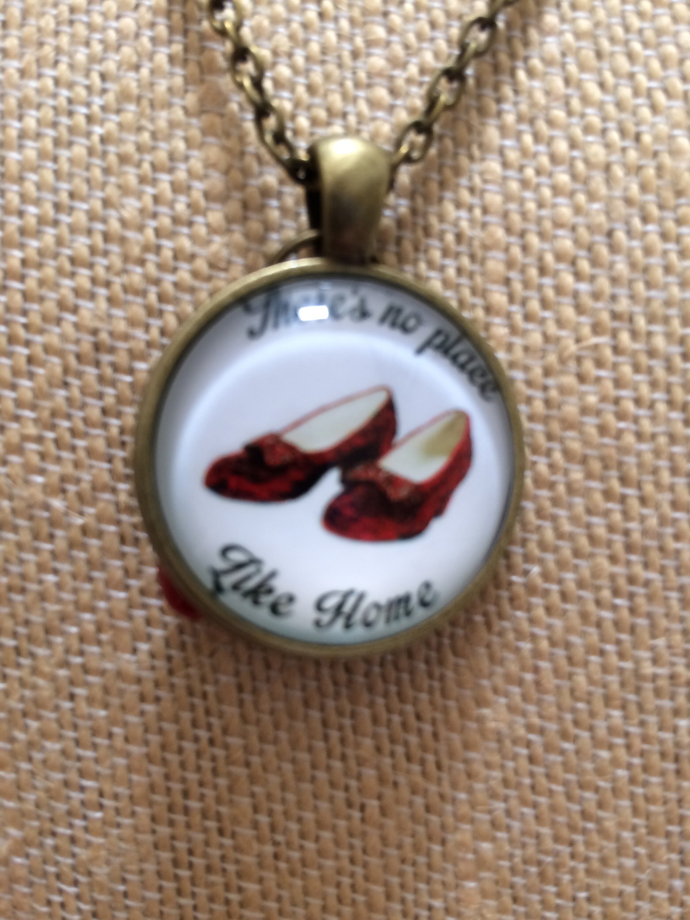 Wizard of Oz Ruby Slippers Necklace, Antique Gold Metal, there's No