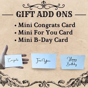 May include: Three small cards with handwritten messages: "Congrats", "For You", and "Happy Birthday". The cards are on a beige background with a decorative border.