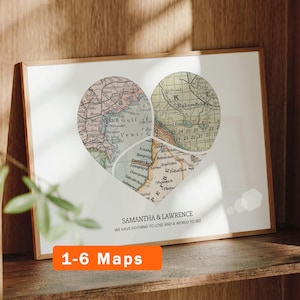 May include: A framed print featuring three map segments arranged into a heart shape. The map sections show geographic details including the Gulf of Venice and Bakersfield. Below the heart, the text reads SAMANTHA & LAWRENCE WE HAVE NOTHING TO LOSE AND A WORLD TO SEE.