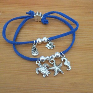 Bracelet, children&#39;s, leather cord w/sea animal charms