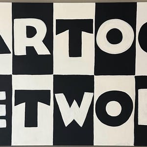 May include: A black and white painting displaying the words "CARTOON NETWORK" in large, white letters. The letters are set against a checkerboard pattern of black and white squares. A striking piece of wall art.