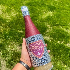 Iona University bottle with maroon and gold glitter.