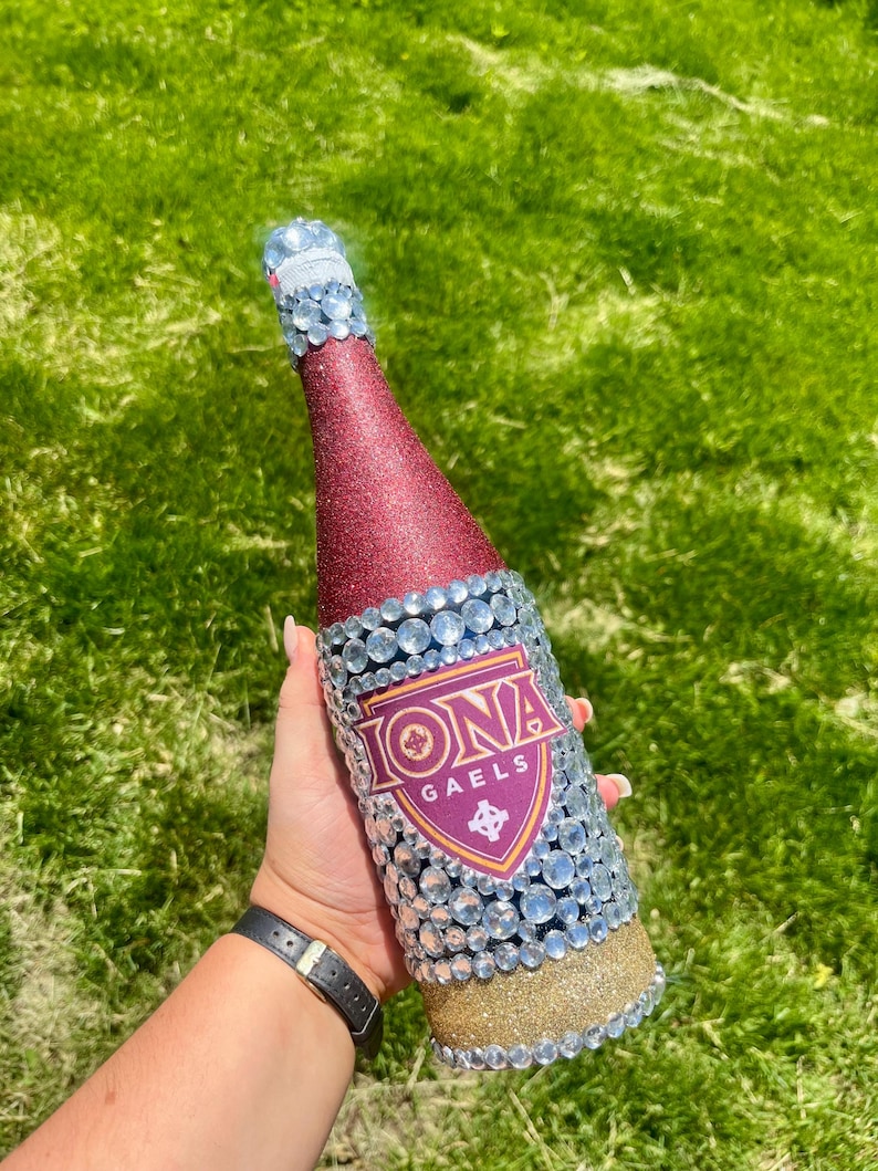 Iona University bottle with maroon and gold glitter.