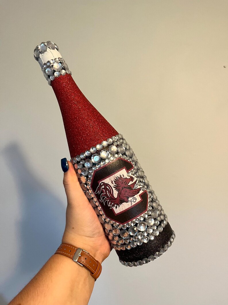 University of South Carolina bottle with maroon and black glitter.