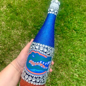 University of Florida bottle with blue and orange glitter.