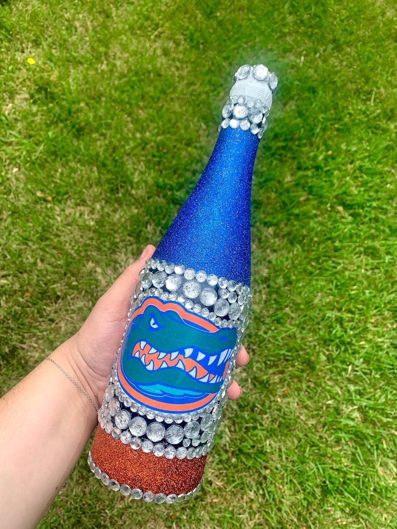 University of Florida bottle with blue and orange glitter.