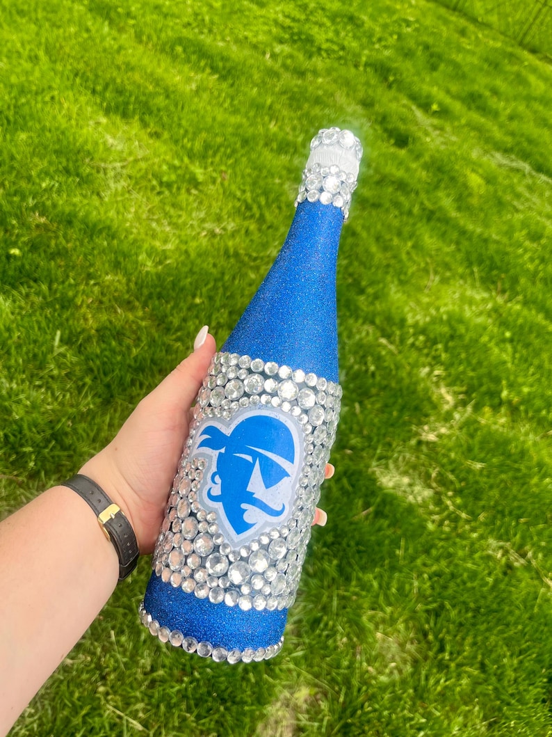 Seton Hall University bottle with blue glitter.