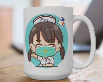 May include: White ceramic mug featuring a cartoon nurse with brown hair, wearing a face mask and a nurse's cap with the word "Pinay". The design includes a teal background and a Philippine flag.
