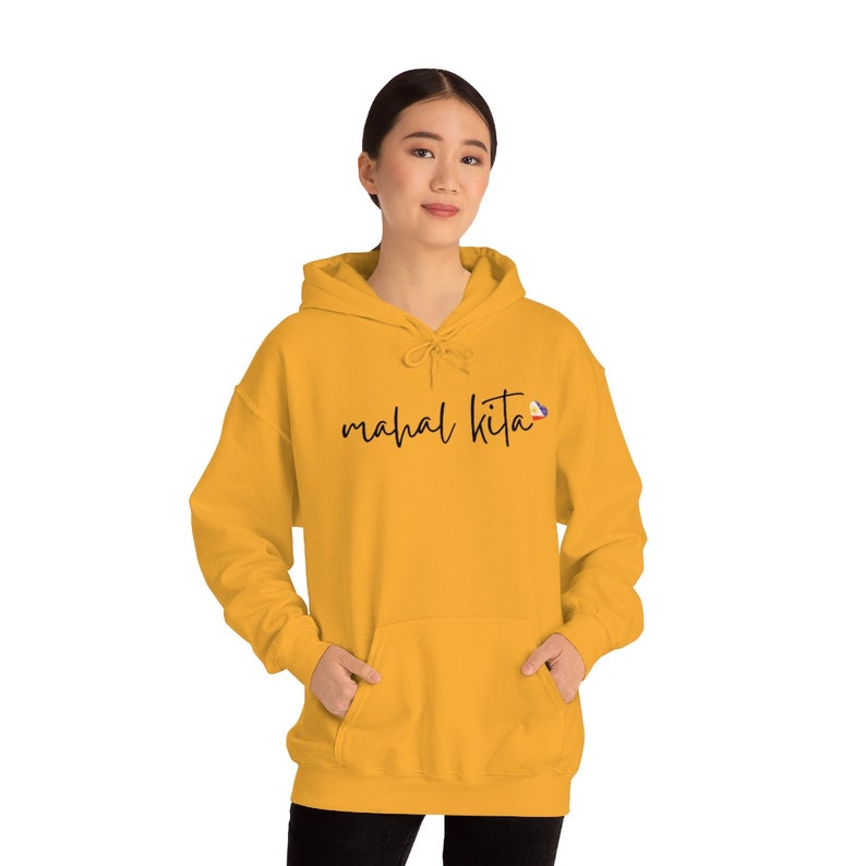 May include: A mustard yellow hoodie with a black print that says "mahal kita" and a small Philippine flag graphic.