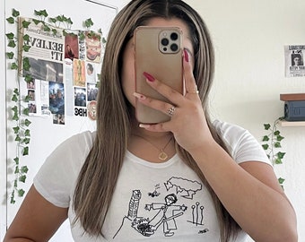 The Draco's Drawing Baby Tee.