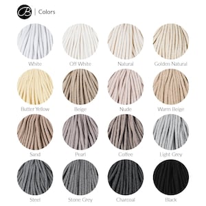 May include: A color chart of 16 different colors of cotton rope. The colors are: White, Off White, Natural, Golden Natural, Butter Yellow, Beige, Nude, Warm Beige, Sand, Pearl, Coffee, Light Grey, Steel, Stone Grey, Charcoal, and Black.
