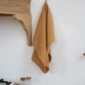 Beautiful organic linen towel made from 100% natural flax — soft, durable, and eco-friendly. Perfect as a kitchen or bath tea towel, this high-quality handmade linen sheet brings a warm natural texture to any home. Ideal sustainable gift for Thanksgiving dinner, Christmas morning, New Year’s Eve celebration, or Valentine’s Day. Elegant and timeless design by CoolLinen — modern organic home décor brand focused on quality, simplicity, and sustainability.