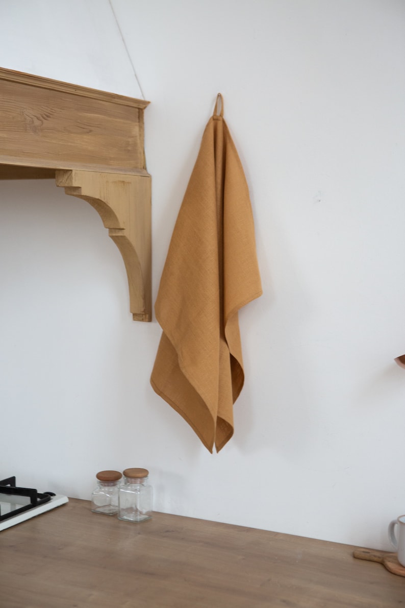 Beautiful organic linen towel made from 100% natural flax — soft, durable, and eco-friendly. Perfect as a kitchen or bath tea towel, this high-quality handmade linen sheet brings a warm natural texture to any home. Ideal sustainable gift for Thanksgiving dinner, Christmas morning, New Year’s Eve celebration, or Valentine’s Day. Elegant and timeless design by CoolLinen — modern organic home décor brand focused on quality, simplicity, and sustainability.